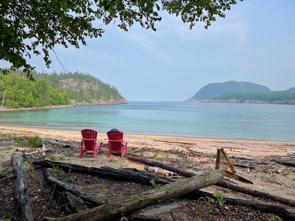 Red chairs on Pukaskwa Coastal Trail