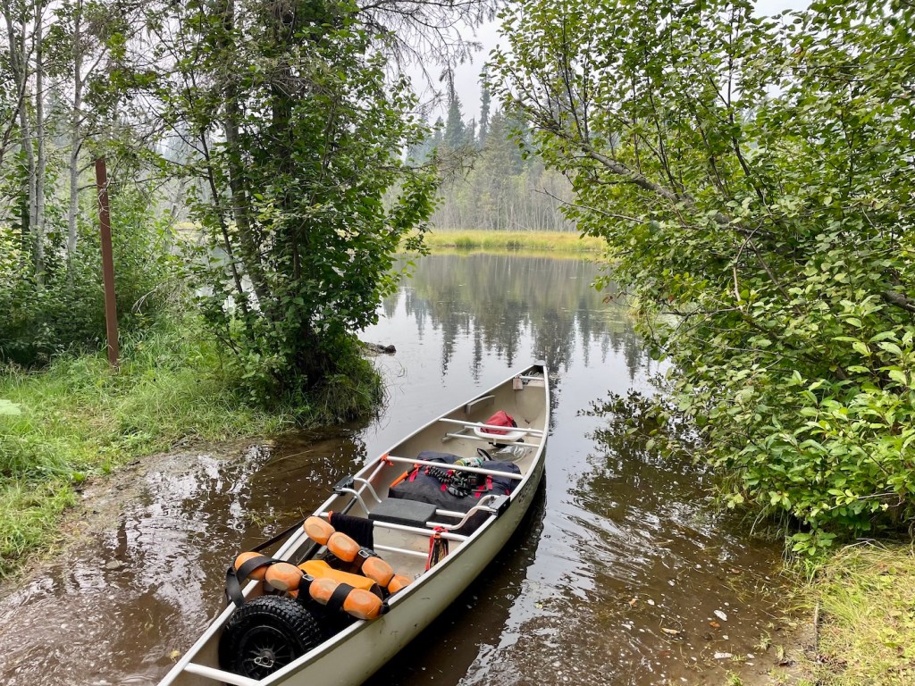 Canoe at portage on Bowron Lakes Canoe Circuit 