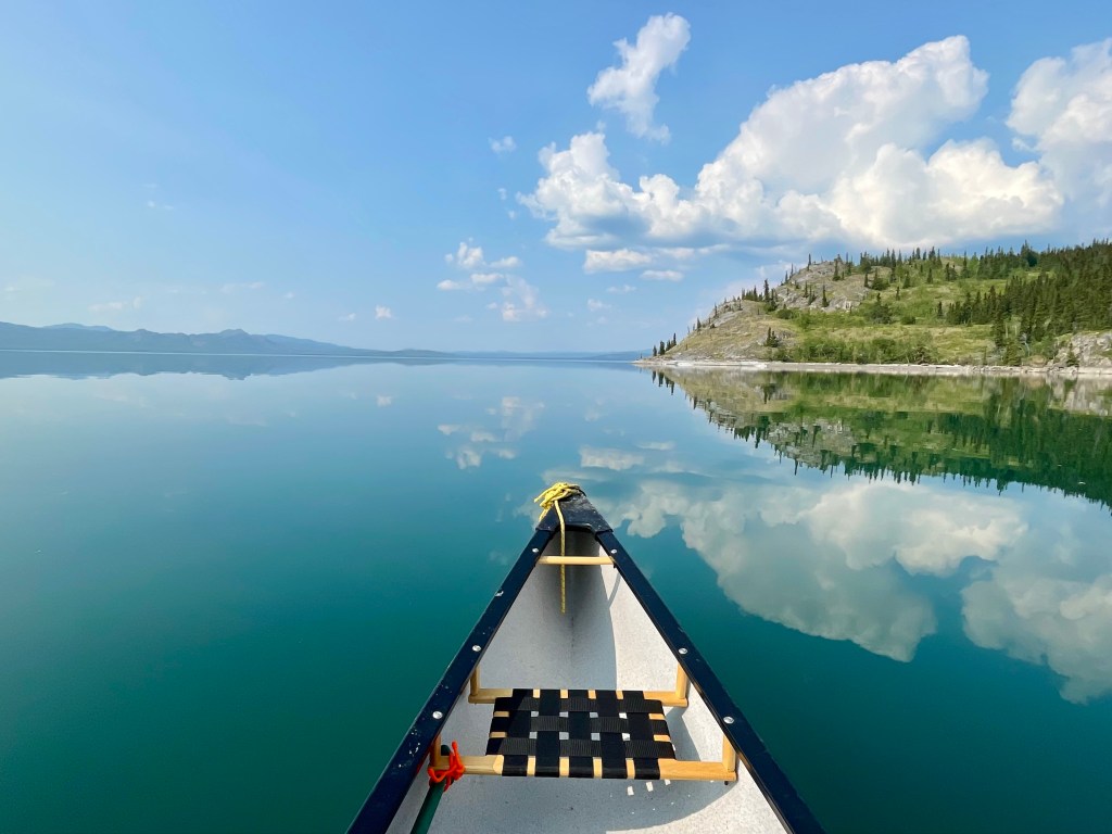 Canoeing the Yukon River on a clear day